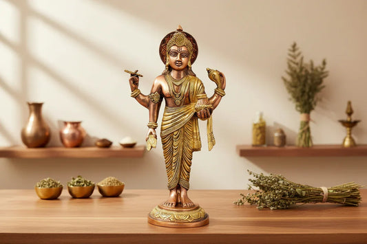 Handcrafted 15-inch solid brass Dhanvantari idol — God of Ayurveda standing with healing herb and Amrita Kalasha, copper and gold two-tone finish on lotus base — ArtyCraftz