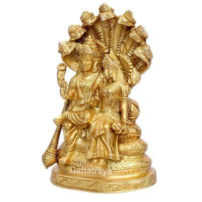 Handcrafted brass Vishnu Lakshmi idol seated together on Sheshnag serpent throne, 21 cm solid brass statue — ArtyCraftz