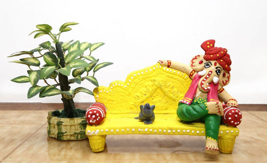Handmade Terracotta Ganesh with mooshika with Yellow sofa Idols for Gifting - ArtyCraftz.com
