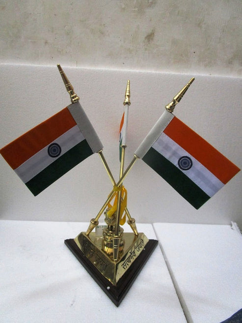 A gold-colored miniature trophy stand featuring three small Indian flags mounted on gold poles, set on a black triangular base with gold lettering.