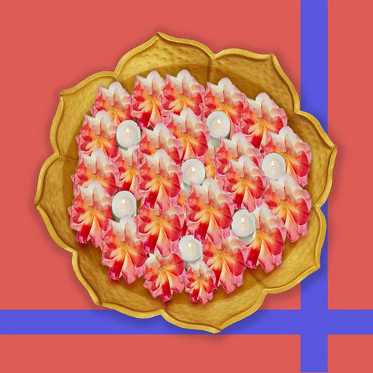 Iron Lotus Shaped Urli Bowl filled with Flowers and Candles