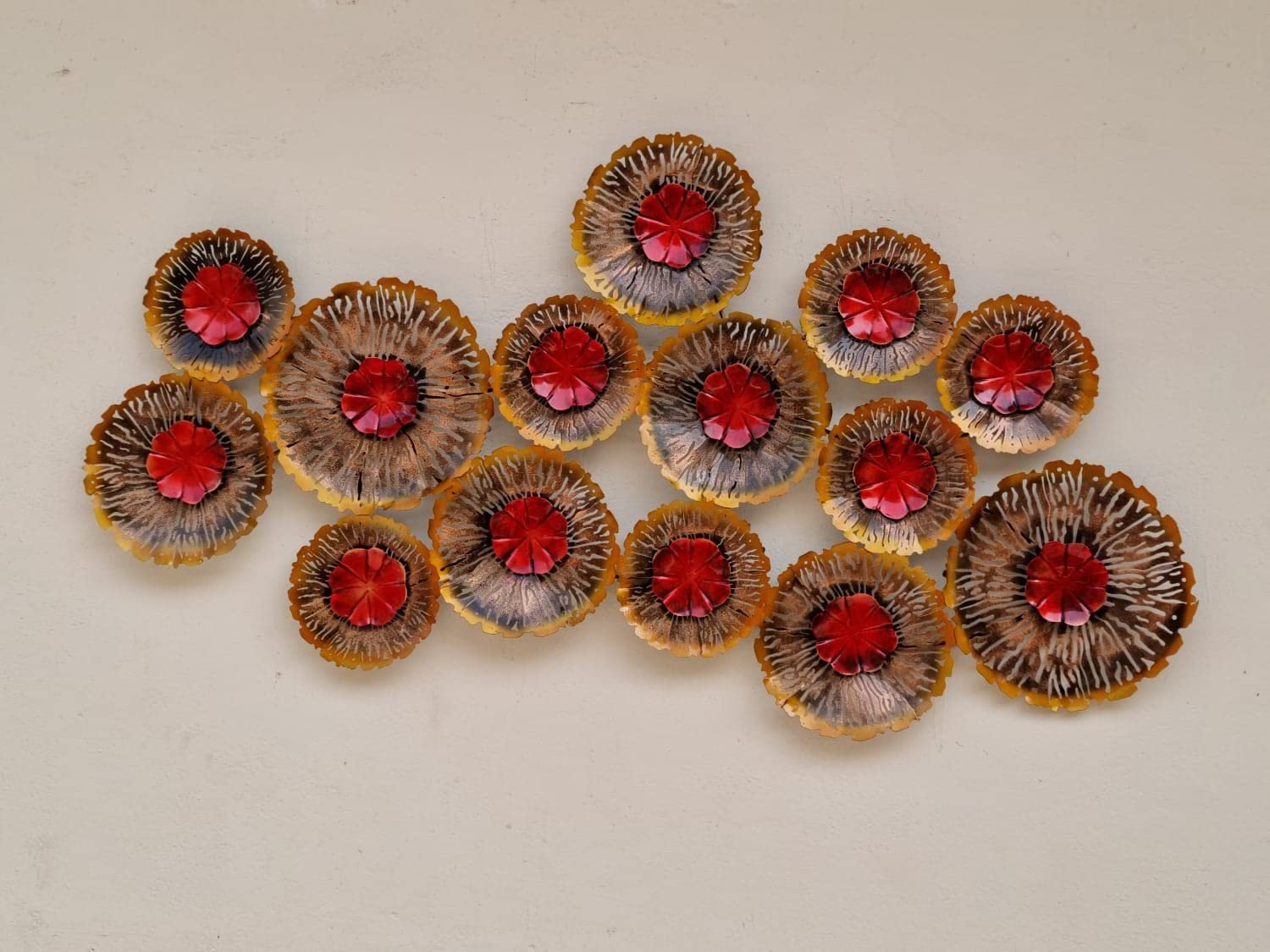 Modern floral metal wall art featuring multiple textured flowers with red centres-ArtyCraftz.com
