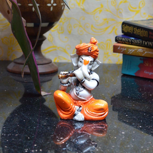 Orange Resin Flute Ganesh Musical Showpiece-ArtyCraftz.com
