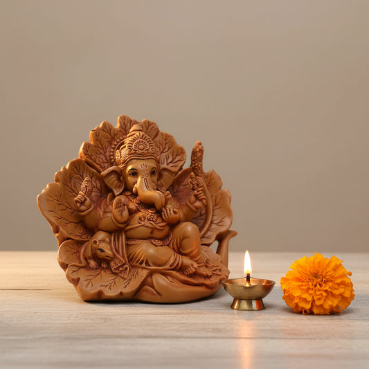 Resin Ganesha with Decorative Pepal Leaf Backdrop Statue-ArtyCraftz.com