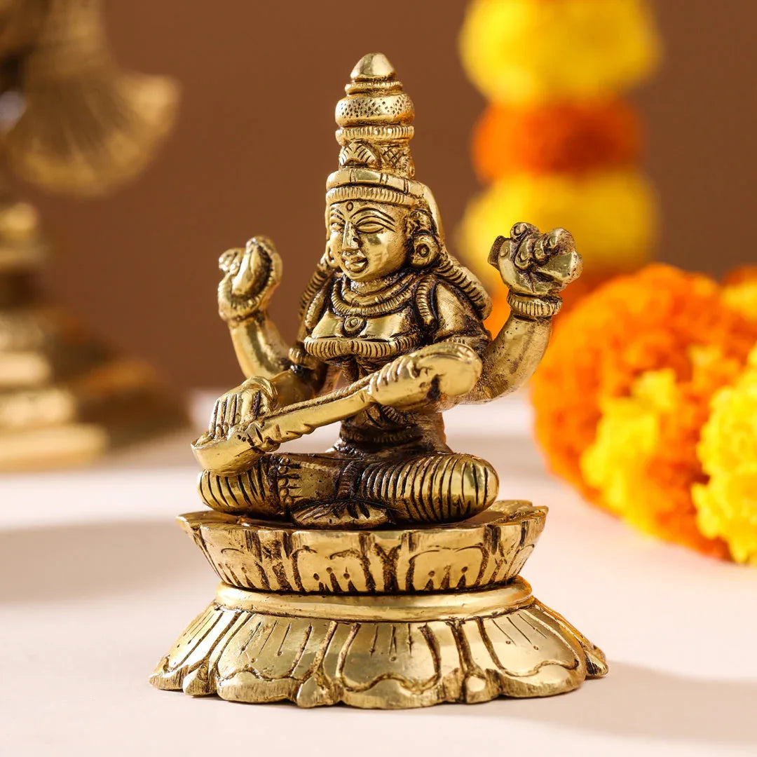 Brass Saraswati idol playing veena-artycraftz.com