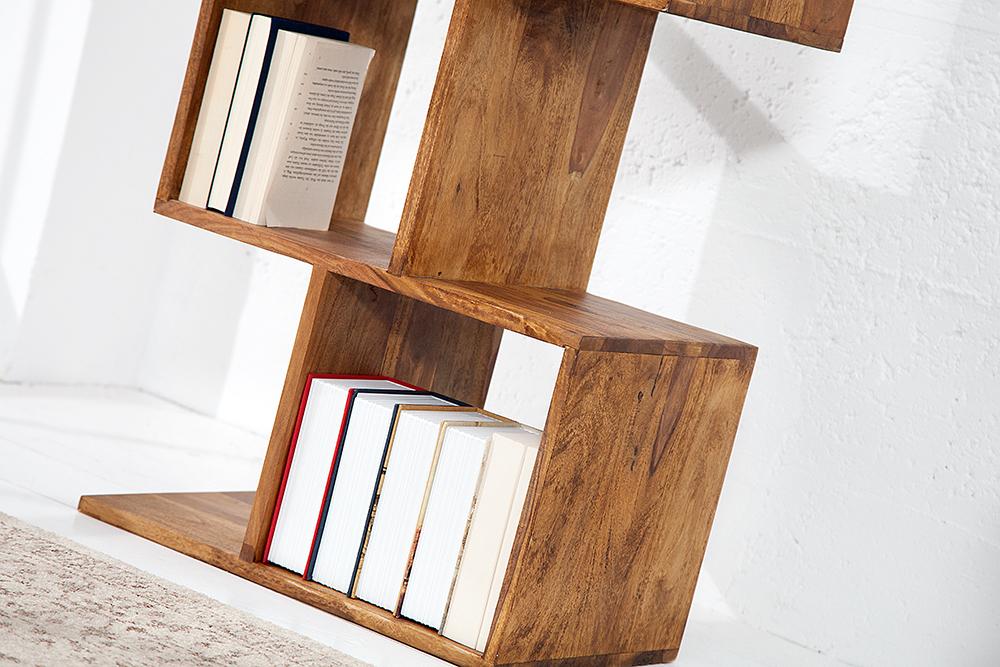 Wooden bookshelf with books on a white background