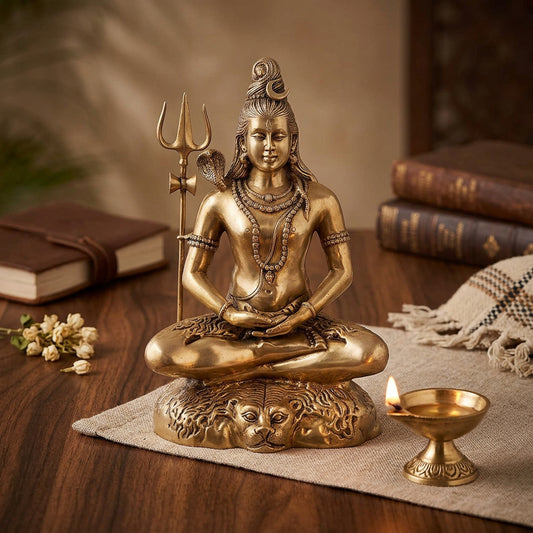 Brass Lord Shiva statue seated in meditation with Trishul, cobra and detailed golden-tone base-atycratz.com
