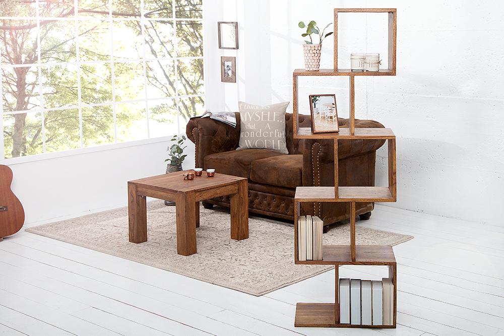 Wooden furniture set including a sofa, coffee table, and bookshelf in a bright living room.