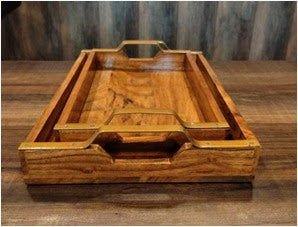 Set of 2 handcrafted acacia wood serving trays with brass arch handles — large 14x10 inch and small 12x8 inch, natural dark golden-brown grain finish — ArtyCraftz