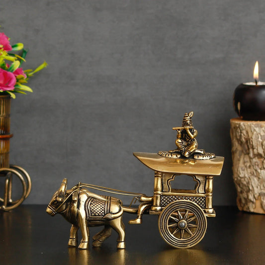 Golden Brass Lord Krishna Idol Sitting In Bullock Cart Showpiece - ArtyCraftz