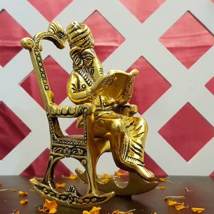 Lord Ganpati Reading Book on Rocking Chair Table Office and Living Room